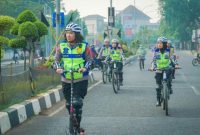 Polwan Cantik di Karawang Berjaga di Gelaran CFD dengan Bersepeda dan Skuter