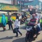 Strong Point Polsek Wanaraja Polres Garut Bantu Aktivitas Masyarakat di Pagi Hari