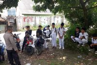 Personil Polsek Tegalwaru Polres Karawang  Ingatkan Pelajar Taat Hukum dalam Giat Operasi Bina Kusuma Lodaya