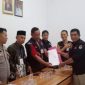 Bripka Ginanjar Personil Polsek Cikampek Polres Karawang Monitoring Rapat Pleno Desa Kamurang