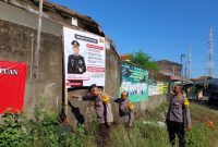 Polsek Cikelet Polres Garut Laksanakan Pemasangan Spanduk Himbauan Tentang Bahaya dan Pencegahan Tindak Pidana Perdagangan Orang