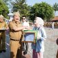 Caption Bupati Garut saat apel di lapangan setda