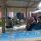 Caption : Polsek Caringin Sosilisasikan Polisi RW