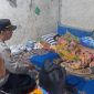 Caption : Kapolsek Cikajang Giat Jumat Berkah 
