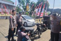 Caption : Polsek Pasirwangi razia knalpot racing