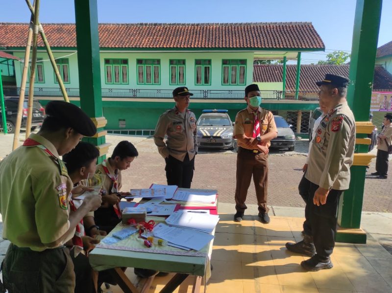 Caption : Kapolsek Karangpawitan Membuka Kegiatan Kursus Mahir Pembinaan Pramuka
