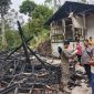 Caption : Olah TKP Polsek Bungbulang di TKP kebakaran