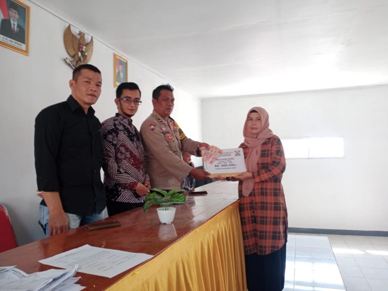 Caption : Polsek Pasirwangi monitoring penyaluran BLT