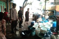 Caption : Polsek Cisurupan salurkan air bersih