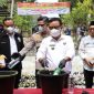 Pj Bupati Garut Barnas Adjidin saat pemusnahan miras dan knalpot brong di Mapolres Garut, (Foto:Istimewa*).