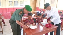Danramil 1102/Karangpawitan Kapten Inf Hartono Panggabean, (Foto:Istimewa).
