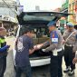 Giat Baksos Si Propam Polres Garut di jalan A.Yani, (Foto:Istimewa).