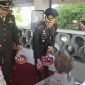 Kapolres Garut, AKBP Mochamad  Fajar Gemilang bersama Unsur Forkopimda melaksanakan kegiatan ziarah ke makam Bupati Garut pertama, R.A.A Adiwijaya, yang terletak di Kampung Cipejeuh, Kecamatan Garut Kota. Jumat (14/02/2025).
