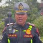 Hujan deras yang mengguyur kawasan Kabupaten Garut sejak Rabu pagi disertai angin kencang, menyebabkan sebuah pohon besar tumbang dan menutup sebagian ruas Jalan Suherman, Kecamatan Tarogong Kaler. Kamis (24/04/2025).