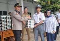Polsek Banyuresmi menghadiri kegiatan Launching Pendistribusian Program Makan Bergizi Gratis (MBG) yang digelar di SMA Negeri 25 Garut, Desa Banyuresmi, Kecamatan Banyuresmi, Kabupaten Garut, Selasa (19/8/2025).