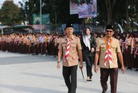 Kapolres Garut AKBP Yugi Bayu Hendarto, S.I.K., M.A.P., menghadiri Upacara Hari Pramuka ke-64 Tahun 2025 yang digelar di Alun-alun Garut, Sabtu (22/8/2025).